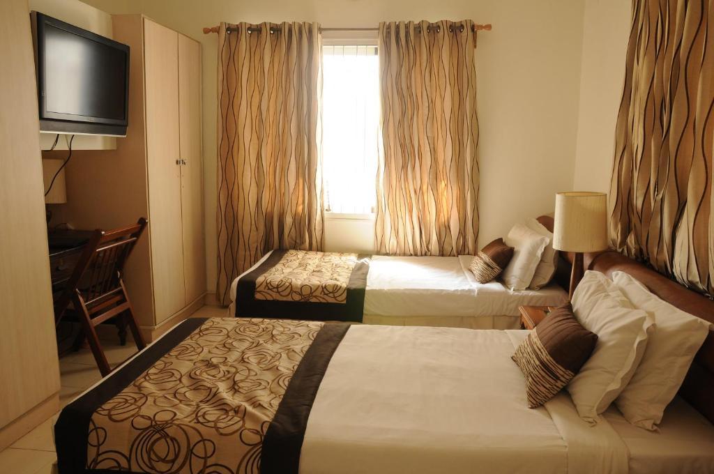 Executive Comfort Alwarpet شيناي الغرفة الصورة